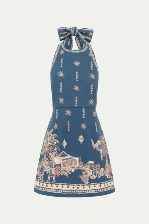 Elegant blue mini dress with intricate white and beige patterns. Perfect for summer events and casua.